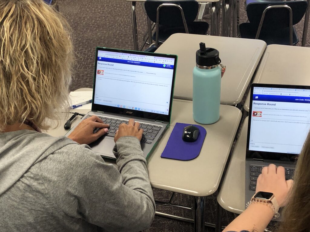 Teacher uses short answer on a computer
